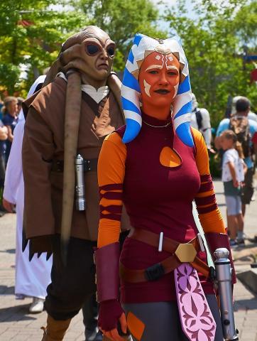 Comic con attendees dressed up as Star Wars characters
