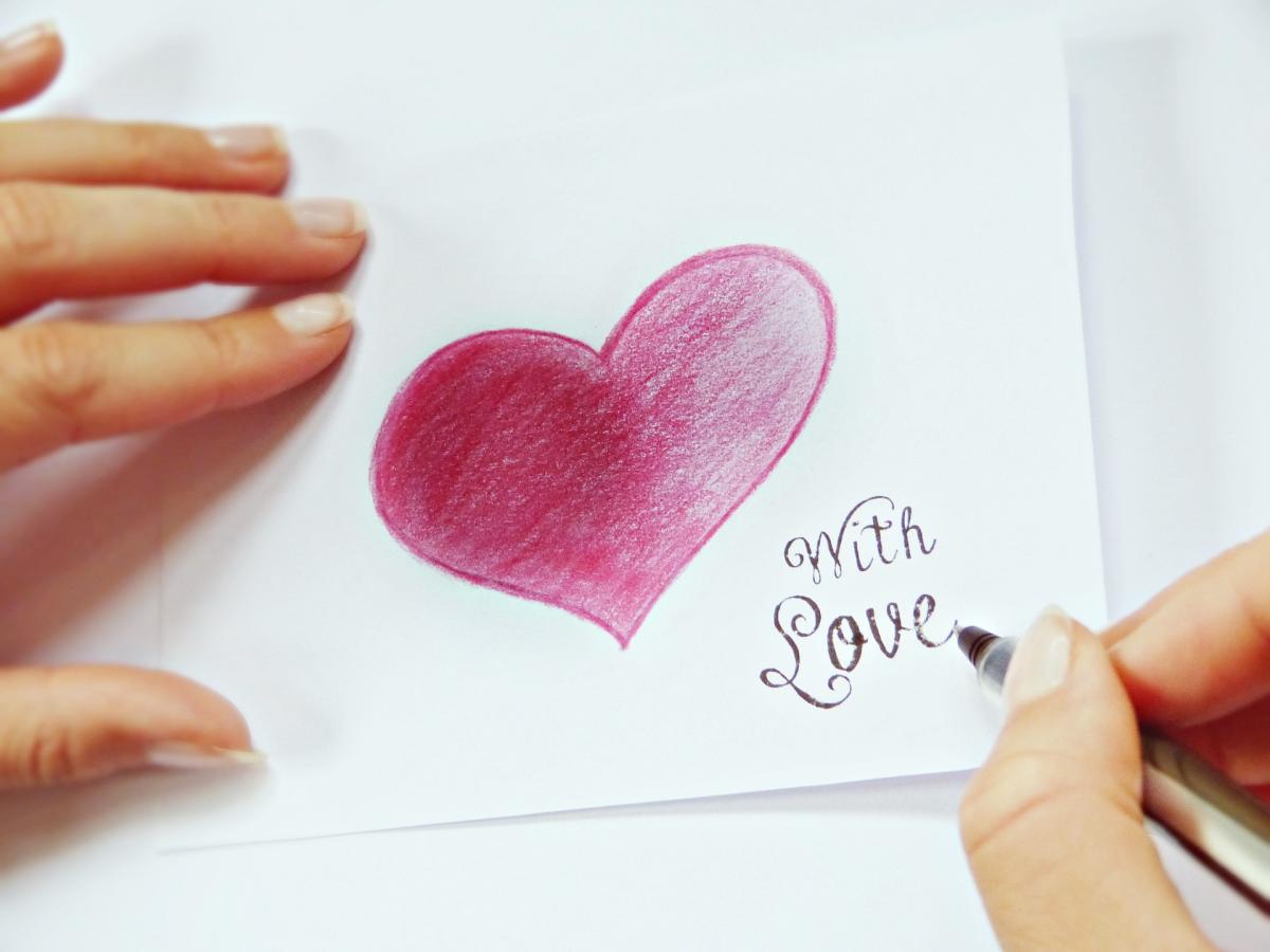 Handwritten with love and red heart note